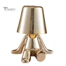 Golden Person Statue Desk Lamp with USB Charging — Study & Desk Lighting, Home Kits