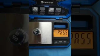 Calibrating Uniweigh P-200 Digital scales and weight test.
